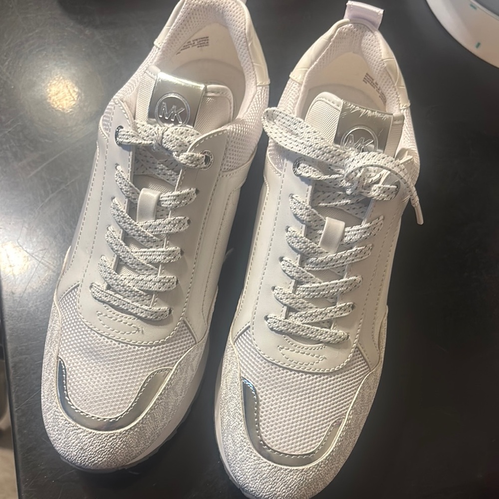 Michael Kors, tennis shoes never worn.
